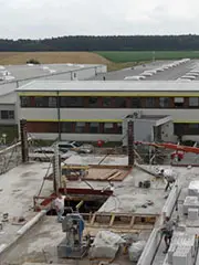 historie Neubau ddes verwaltungsgebäudes